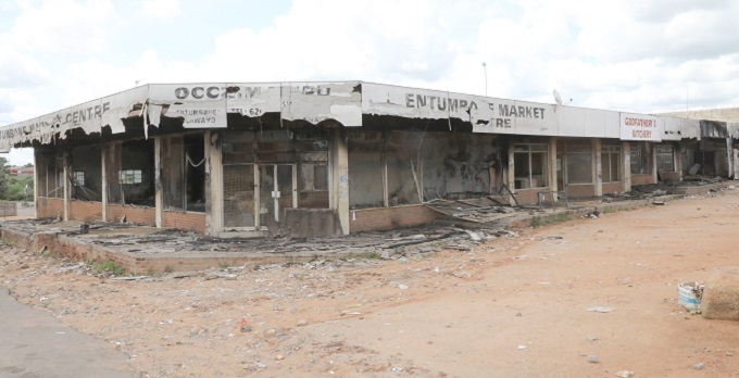  'Looting spells death for Zimbabwe retailers'