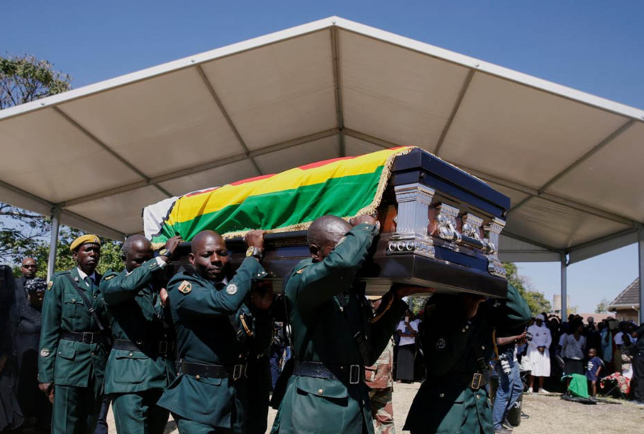 Mugabe buried in low-key ceremony